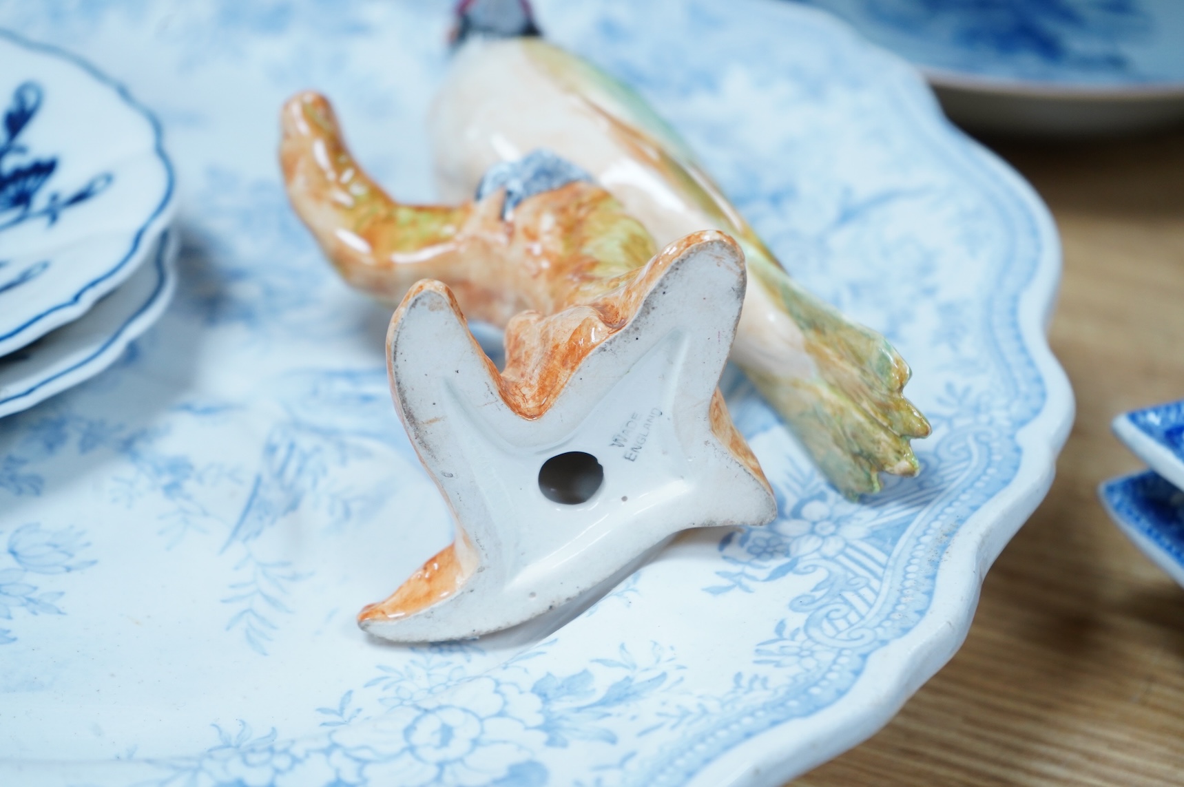 A group of Victorian blue-printed dinner wares, including a Chinese blue and white dish and a Wade bird (13).